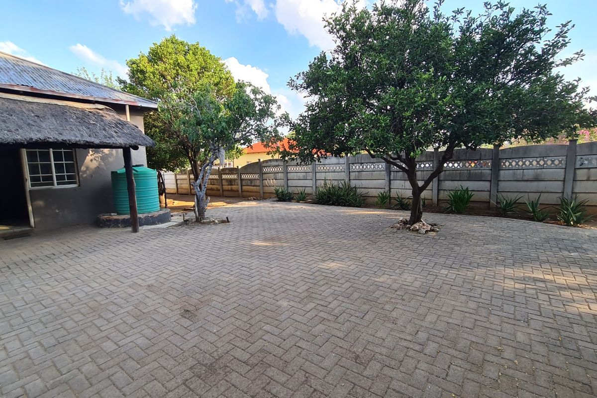 Strategically situated on the corner of a busy street, this residence has lots of additional space on the stand for development. - Photo 3