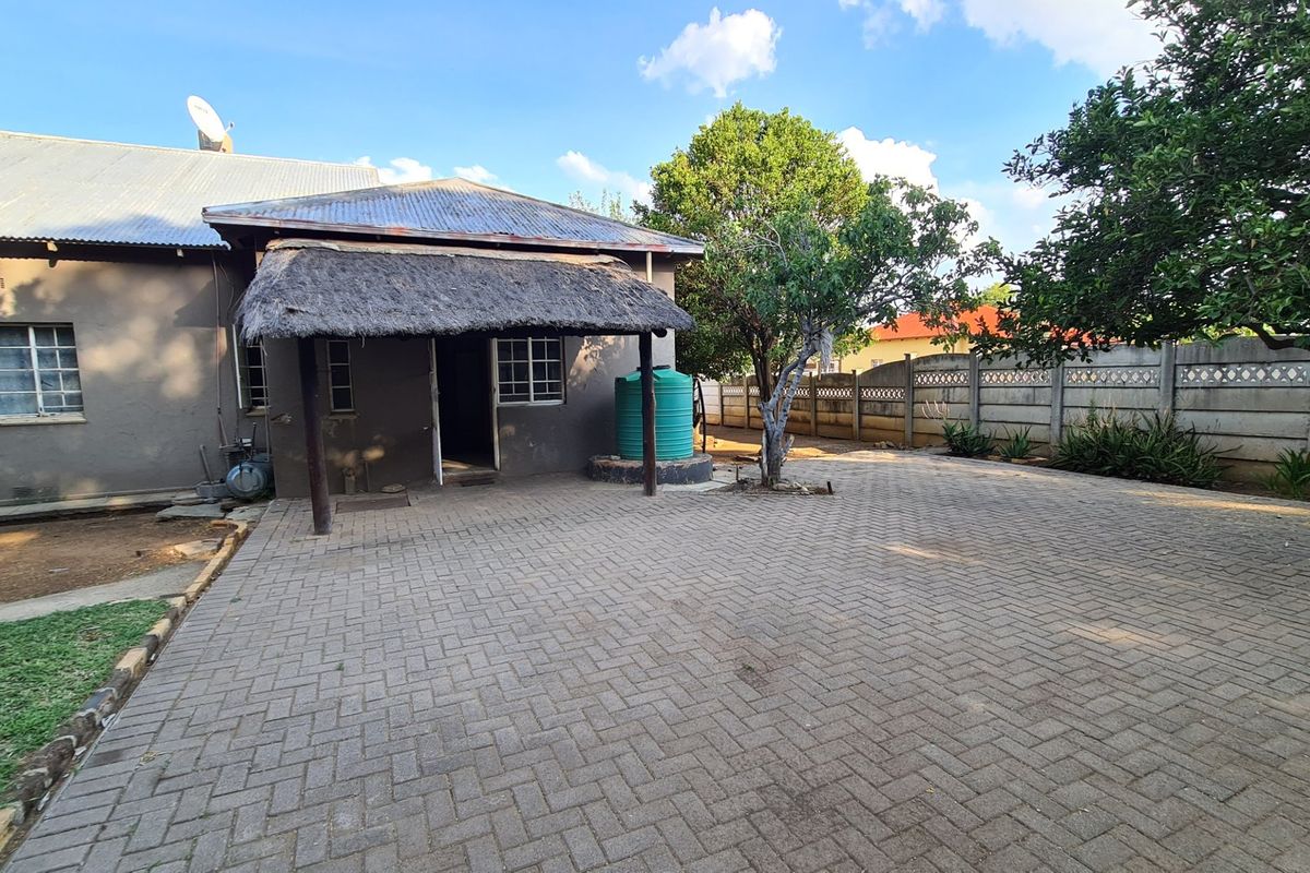 Strategically situated on the corner of a busy street, this residence has lots of additional space on the stand for development. - Photo 4