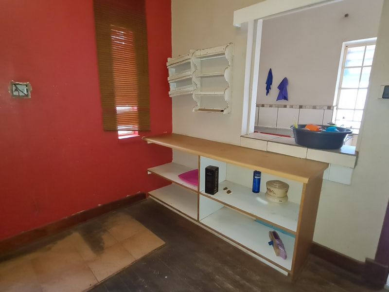 Strategically situated on the corner of a busy street, this residence has lots of additional space on the stand for development. - Photo 10