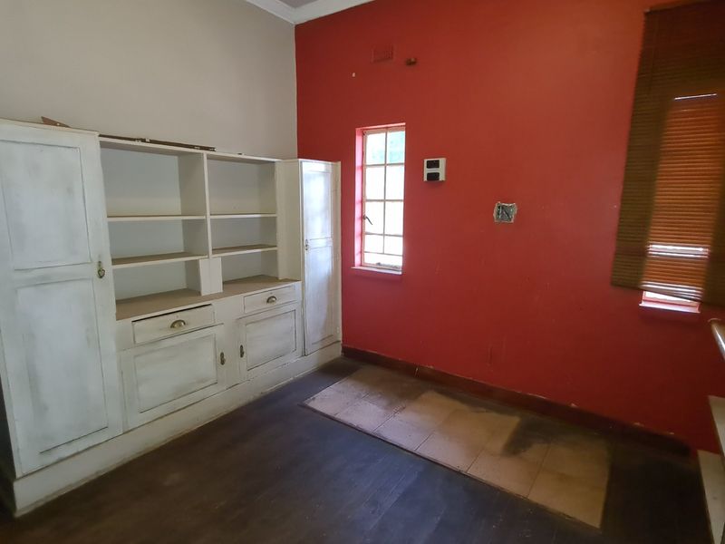 Strategically situated on the corner of a busy street, this residence has lots of additional space on the stand for development. - Photo 8