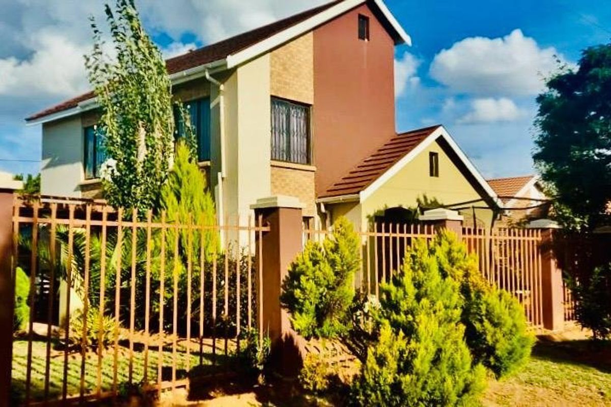 Charming family retreat: A perfectblend of comfort  and security. - Photo 5