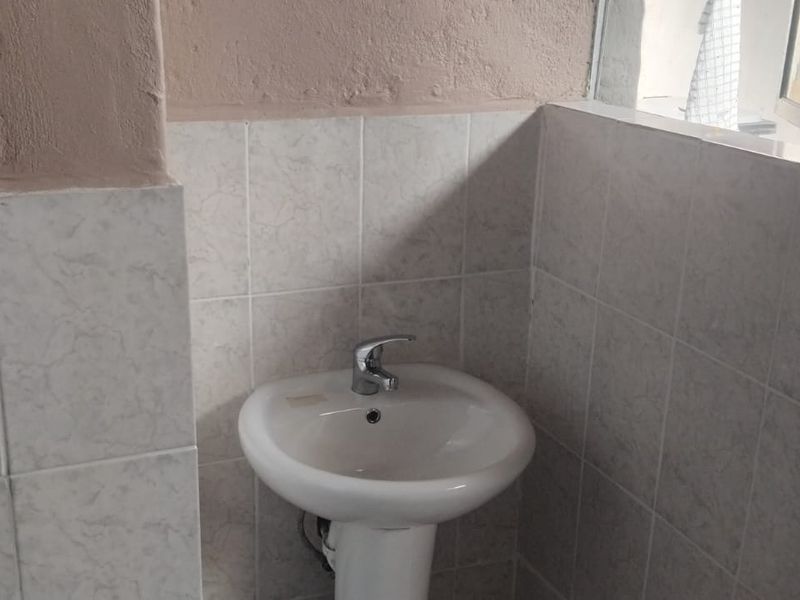 Charming 3-Bedroom Family Home with Granny Flat in Tranquil Neighborhood - Photo 9