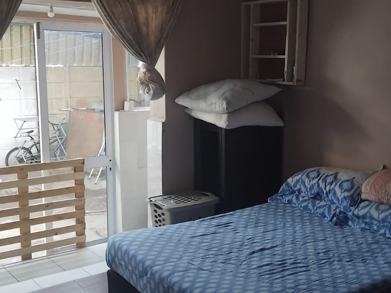 Charming 3-Bedroom Family Home with Granny Flat in Tranquil Neighborhood - Photo 8