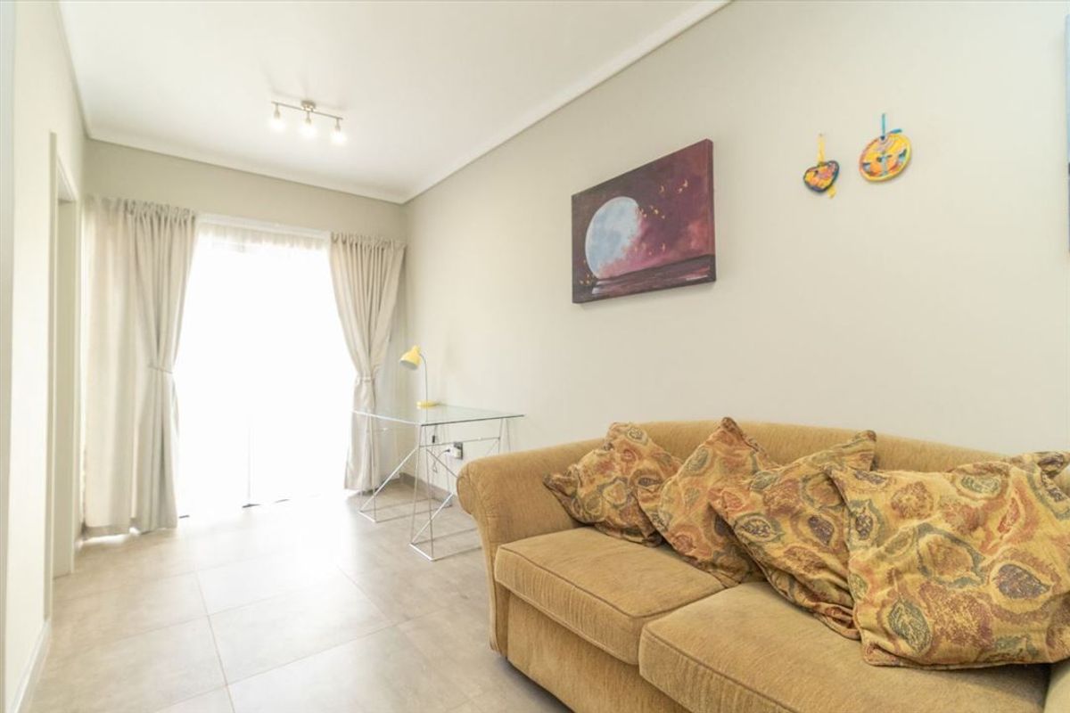 Modern Two-Bedroom Home with Practical Features - Photo 2