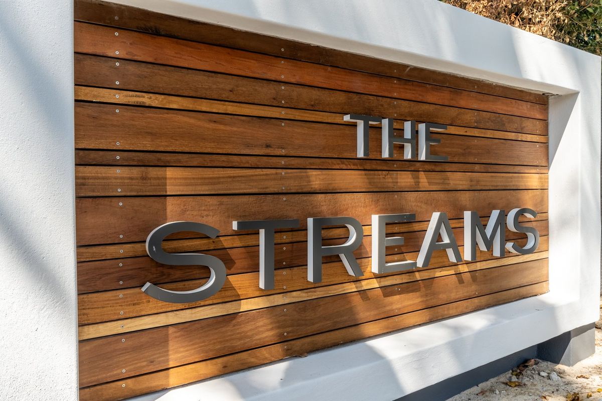 Step into the Streams - Trendy lock-up and go living in quaint Newlands Village - Photo 3