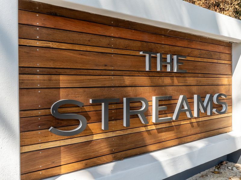 Step into the Streams - Trendy lock-up and go living in quaint Newlands Village - Photo 3