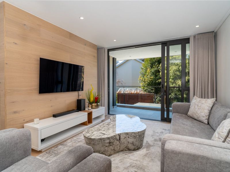 Step into the Streams - Trendy lock-up and go living in quaint Newlands Village - Photo 2