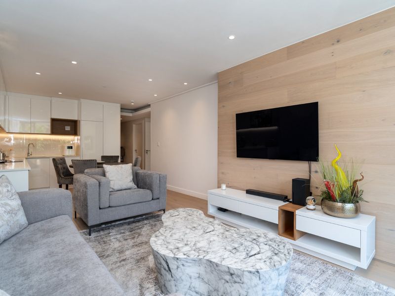 Step into the Streams - Trendy lock-up and go living in quaint Newlands Village - Photo 8