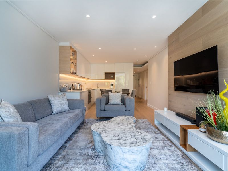 Step into the Streams - Trendy lock-up and go living in quaint Newlands Village - Photo 6