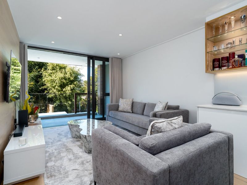 Step into the Streams - Trendy lock-up and go living in quaint Newlands Village - Photo 7