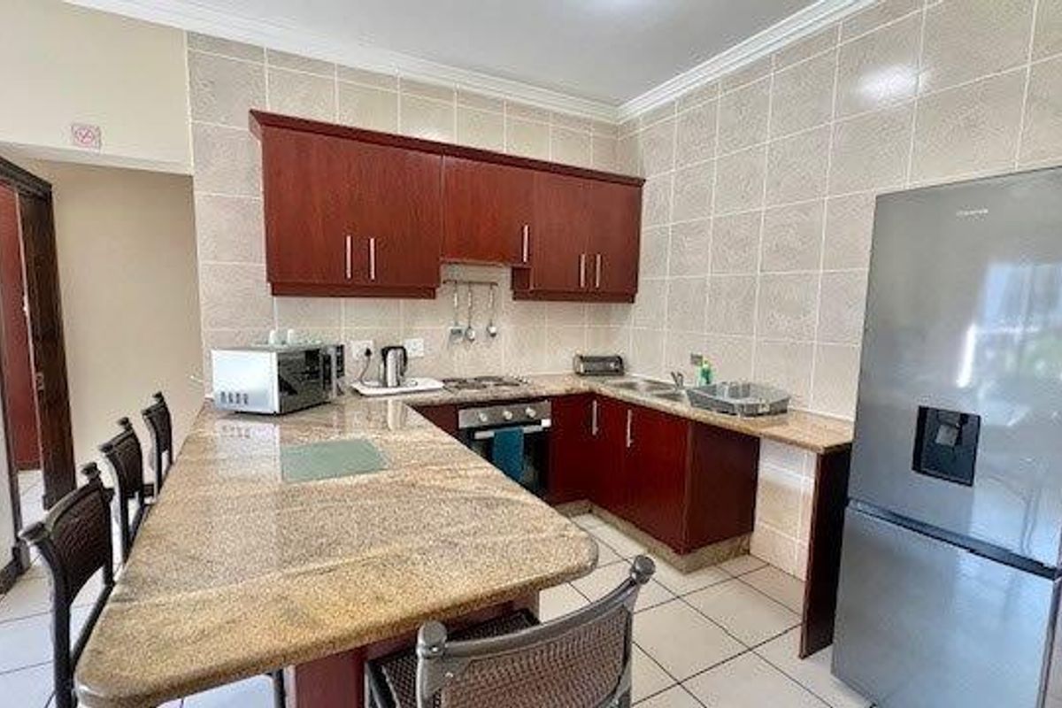 Ground-Floor 2-Bedroom Apartment in Secure Uvongo Complex - Photo 4