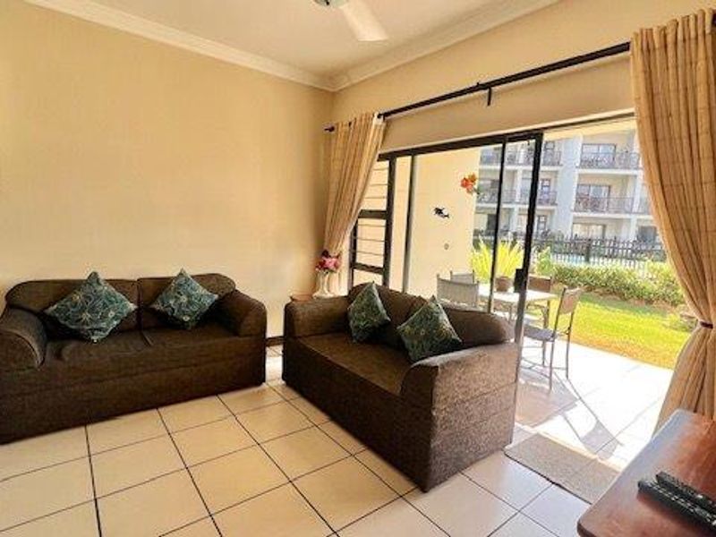 Ground-Floor 2-Bedroom Apartment in Secure Uvongo Complex - Photo 9