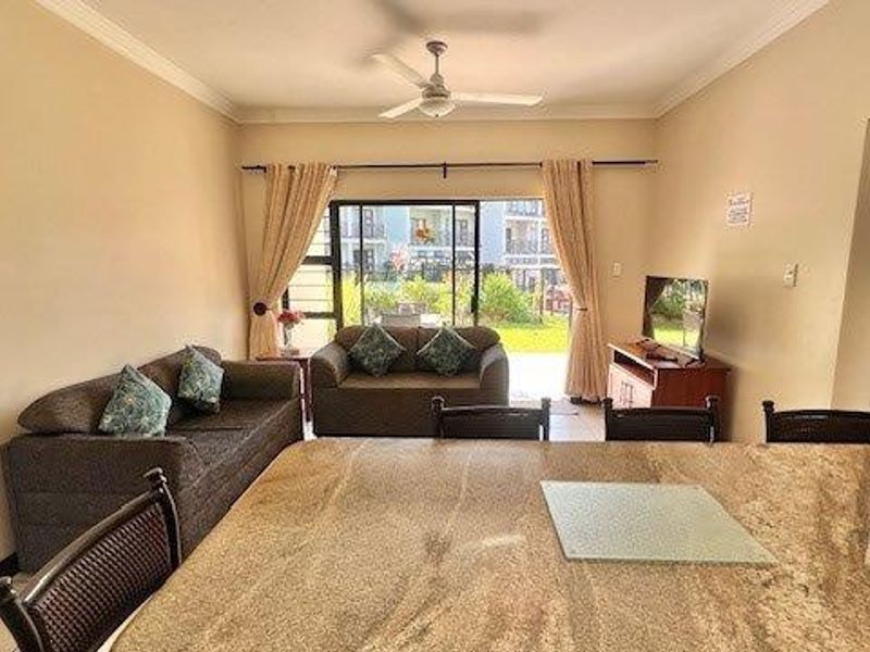 Ground-Floor 2-Bedroom Apartment in Secure Uvongo Complex - Photo 7