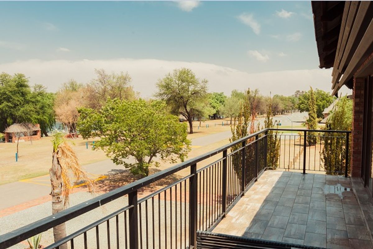 Fabulous property in Orkney Vaal. A substantial home masquerading as a holiday home. - Photo 5