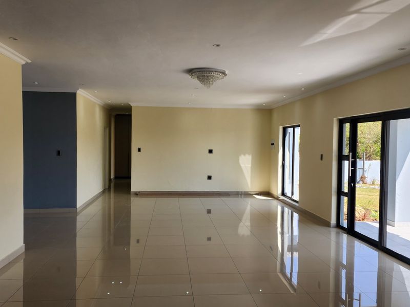 BEAUTY AT IT'S BEST - STUNNING BRAND NEW HOME WITH SPACE, SECURITY, SERENE LOCATION - Photo 4