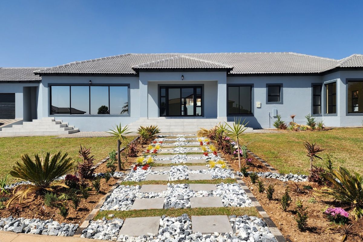 BEAUTY AT IT'S BEST - STUNNING BRAND NEW HOME WITH SPACE, SECURITY, SERENE LOCATION - Photo 2