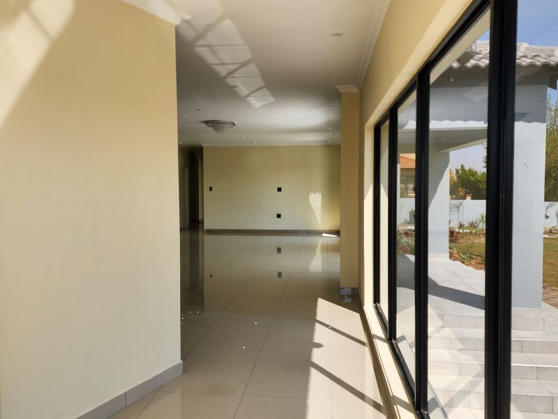 BEAUTY AT IT'S BEST - STUNNING BRAND NEW HOME WITH SPACE, SECURITY, SERENE LOCATION - Photo 9