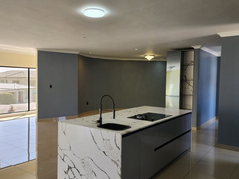 BEAUTY AT IT'S BEST - STUNNING BRAND NEW HOME WITH SPACE, SECURITY, SERENE LOCATION - Photo 6