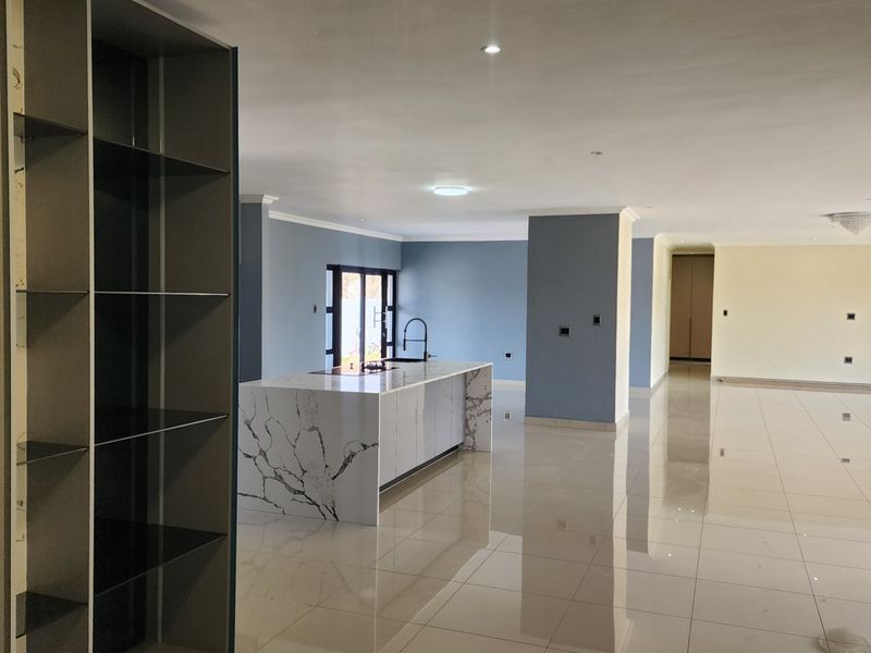 BEAUTY AT IT'S BEST - STUNNING BRAND NEW HOME WITH SPACE, SECURITY, SERENE LOCATION - Photo 5