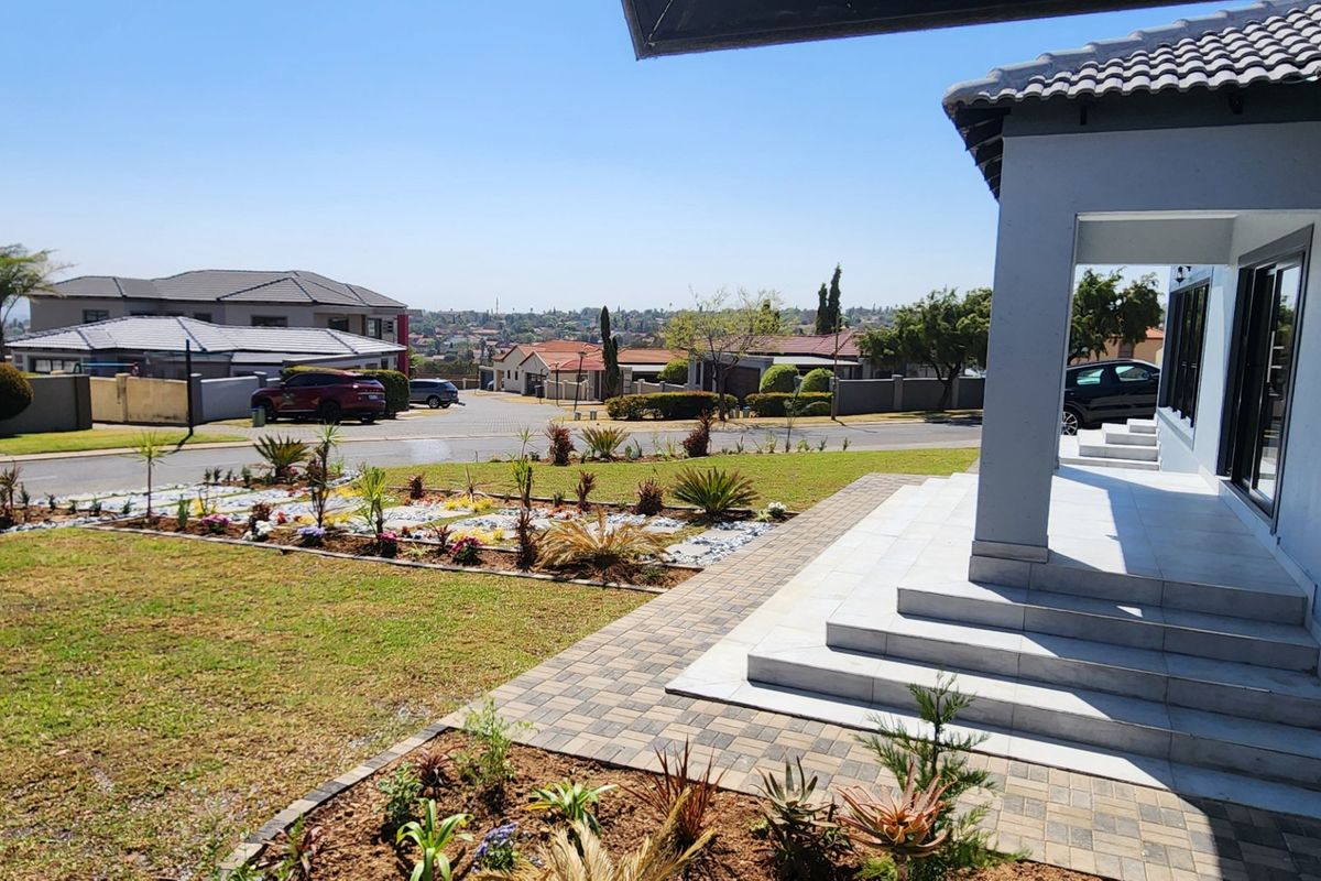 BEAUTY AT IT'S BEST - STUNNING BRAND NEW HOME WITH SPACE, SECURITY, SERENE LOCATION - Photo 2