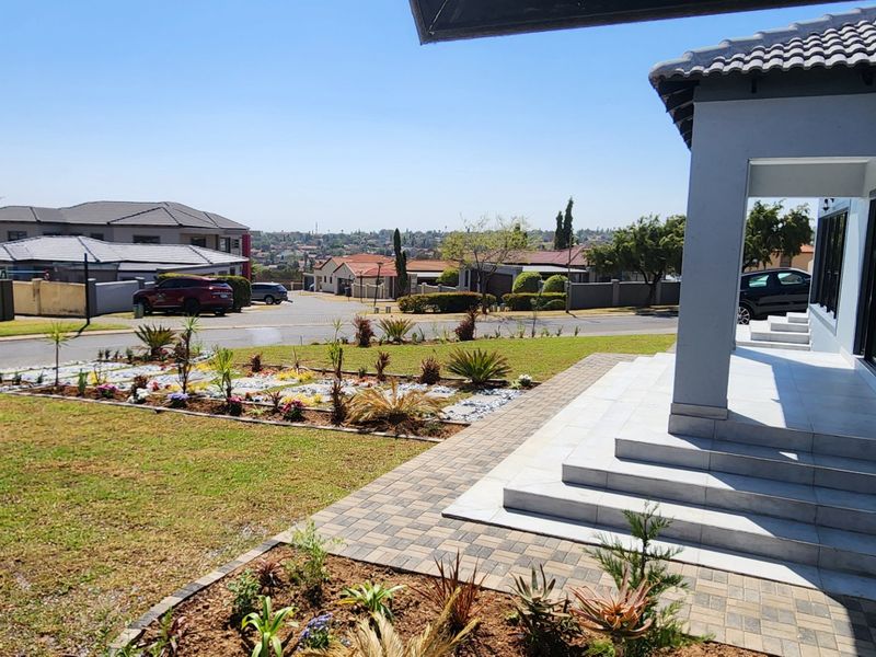 BEAUTY AT IT'S BEST - STUNNING BRAND NEW HOME WITH SPACE, SECURITY, SERENE LOCATION - Photo 2
