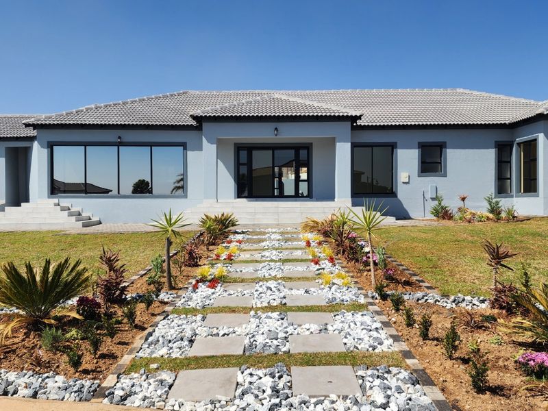 BEAUTY AT IT'S BEST - STUNNING BRAND NEW HOME WITH SPACE, SECURITY, SERENE LOCATION - Photo 1