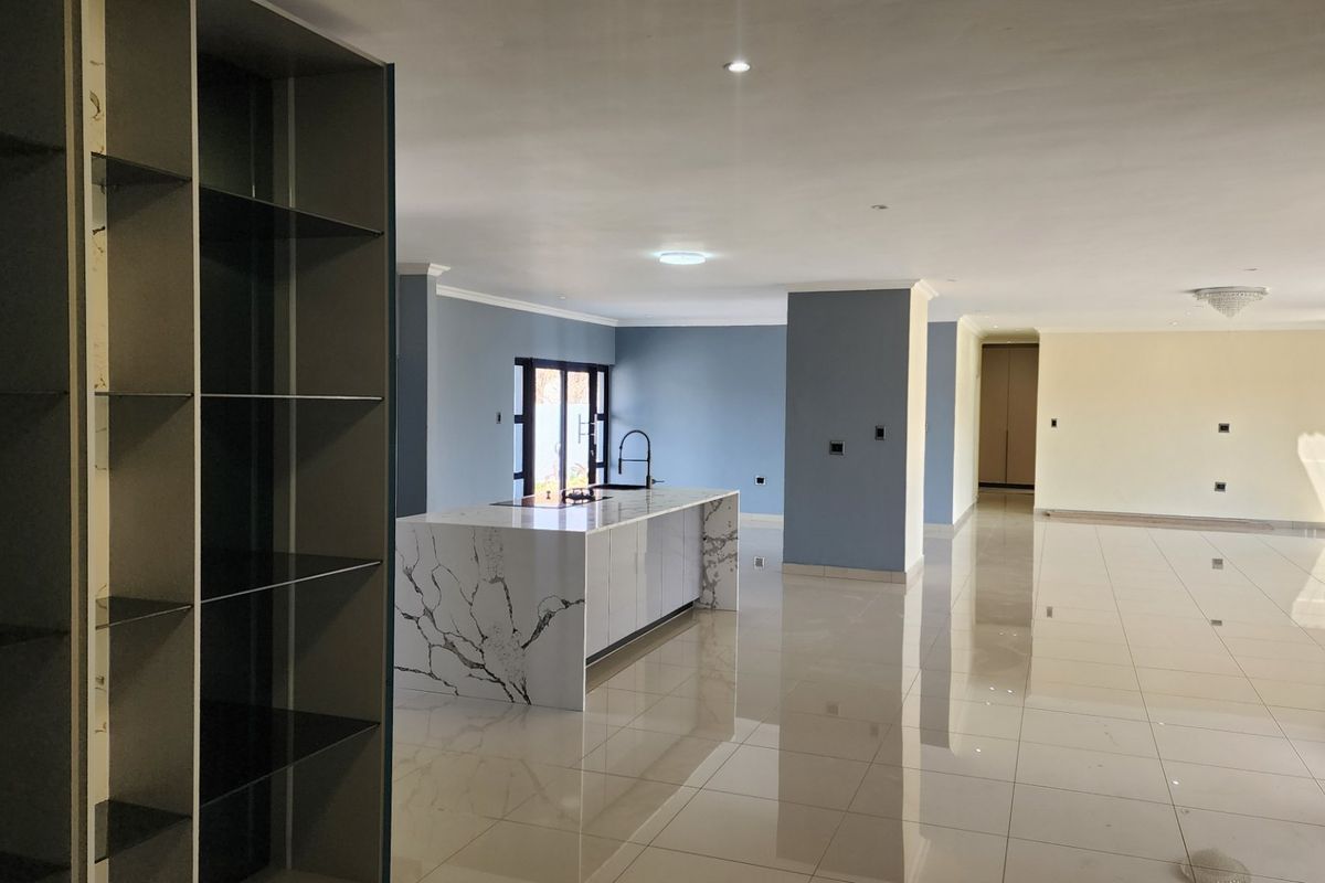 BEAUTY AT IT'S BEST - STUNNING BRAND NEW HOME WITH SPACE, SECURITY, SERENE LOCATION - Photo 5