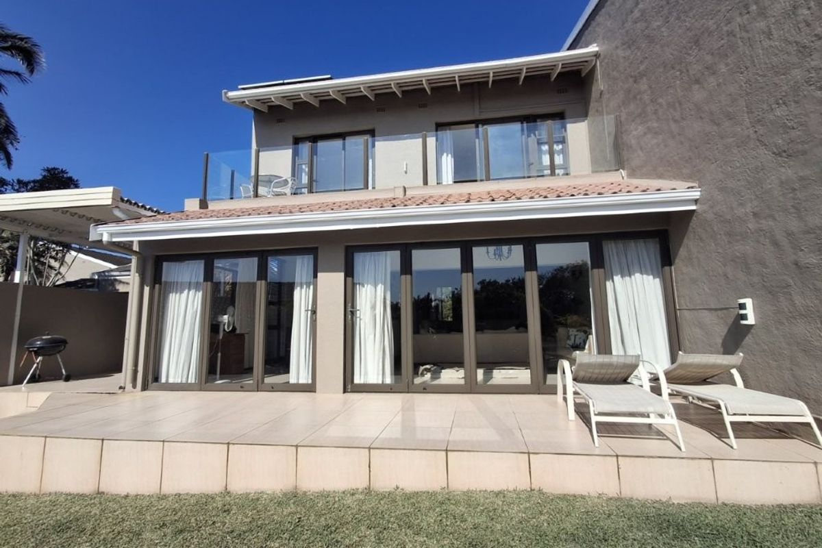 Pristine Townhouse in the much sought after Tibouchina complex, boasting upper-level Ocean vistas!! And BONUS separate guest suite accommodation!!! - Photo 2