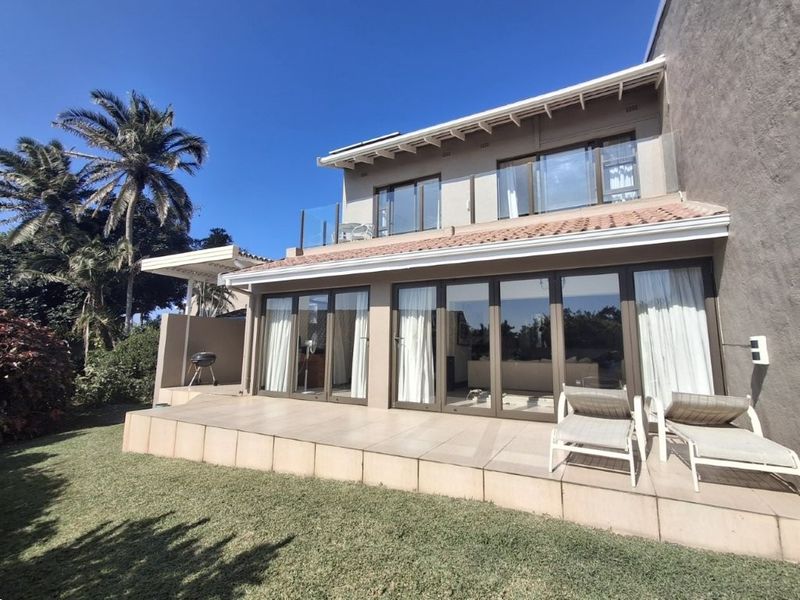 Pristine Townhouse in the much sought after Tibouchina complex, boasting upper-level Ocean vistas!! And BONUS separate guest suite accommodation!!! - Photo 1