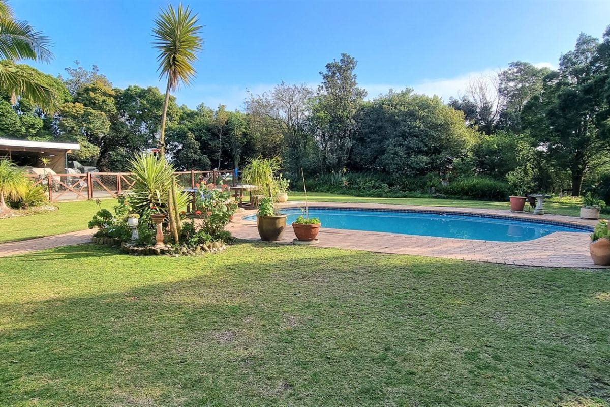 Expansive 9-Bedroom Property with Exceptional Views & Income Potential - Photo 4