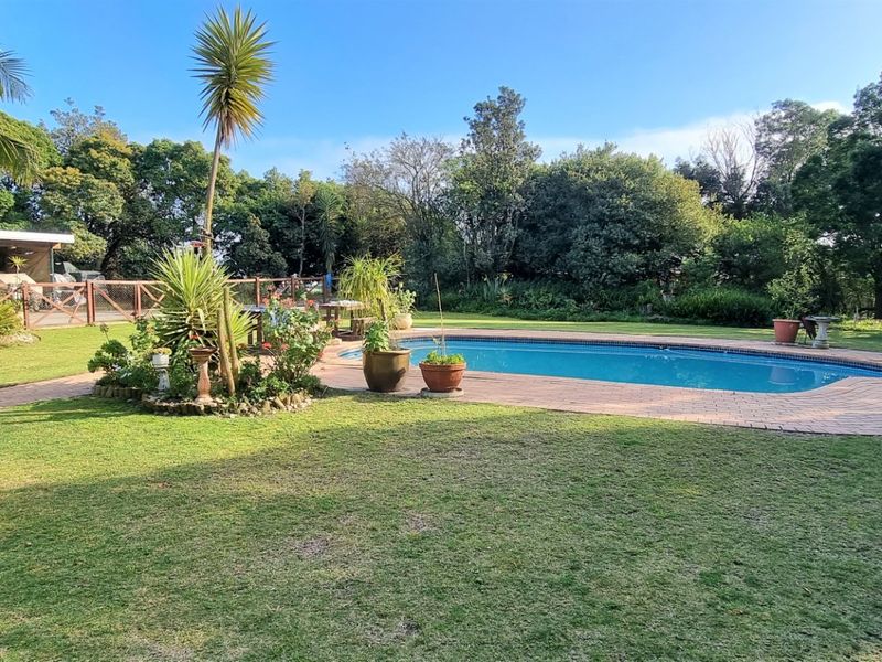 Expansive 9-Bedroom Property with Exceptional Views & Income Potential - Photo 4