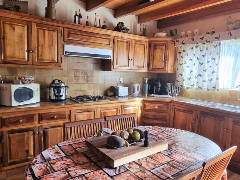 Expansive 9-Bedroom Property with Exceptional Views & Income Potential - Photo 7