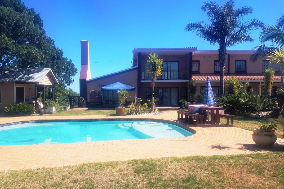 Expansive 9-Bedroom Property with Exceptional Views & Income Potential - Photo 3