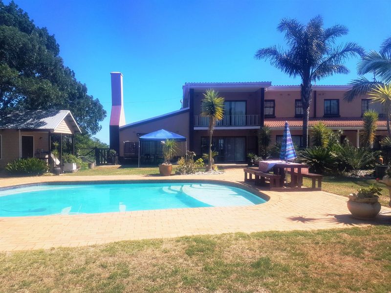 Expansive 9-Bedroom Property with Exceptional Views & Income Potential - Photo 3