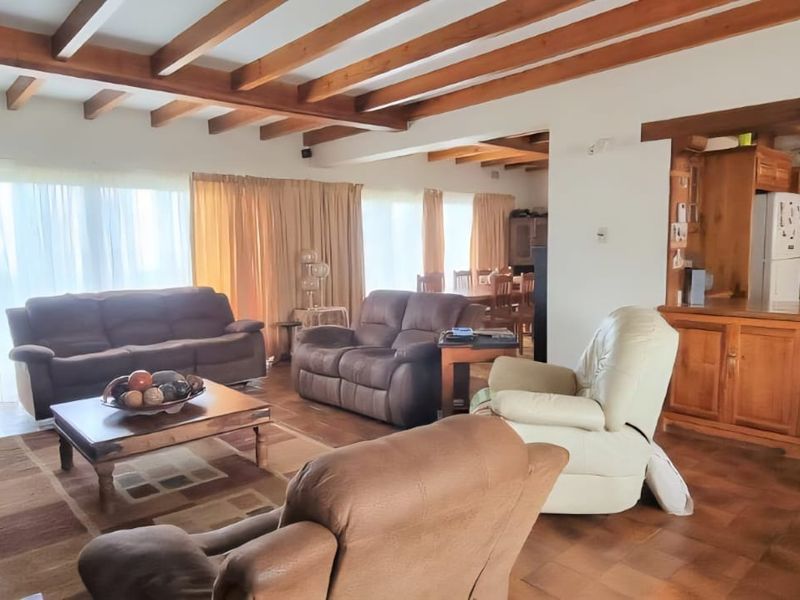 Expansive 9-Bedroom Property with Exceptional Views & Income Potential - Photo 6