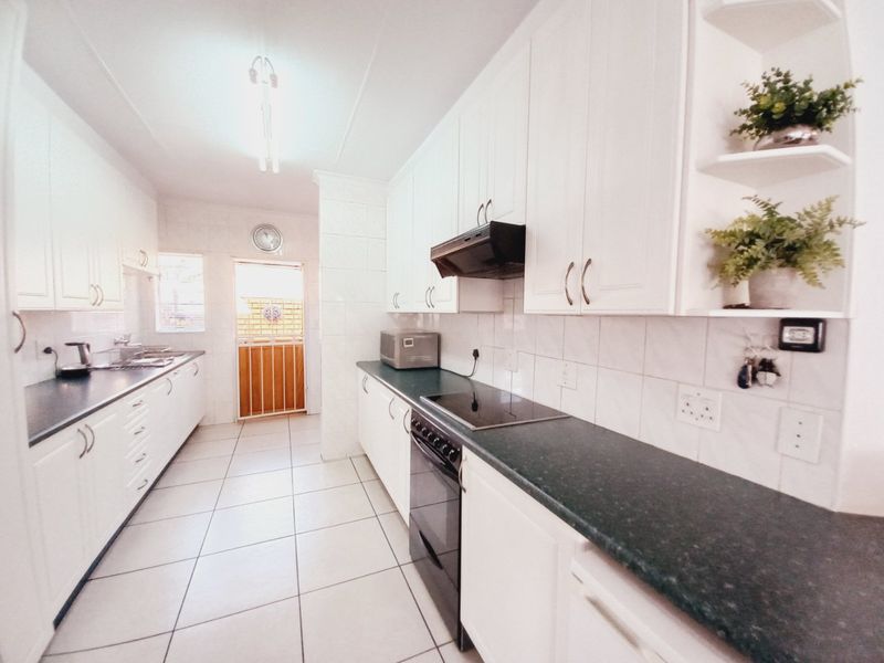 Neat as a Pin Face Brick Simplex Cluster in a Secure Estate in Edenglen - Photo 9