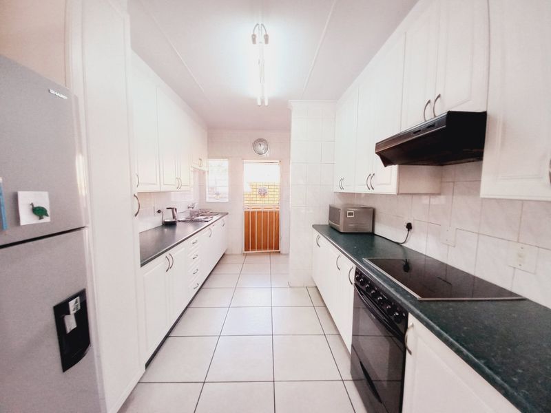 Neat as a Pin Face Brick Simplex Cluster in a Secure Estate in Edenglen - Photo 6