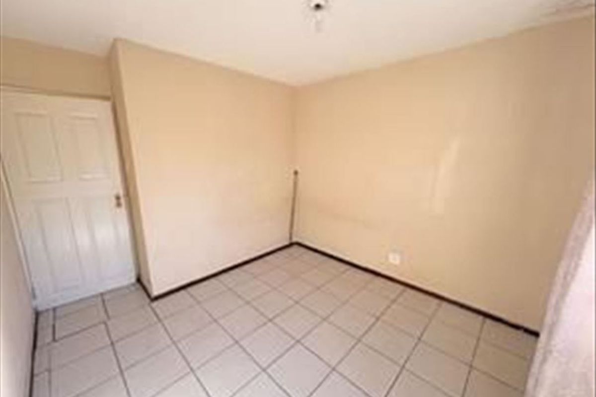 Charming 3-Bedroom Home with Functional Layout and Carport - Photo 3