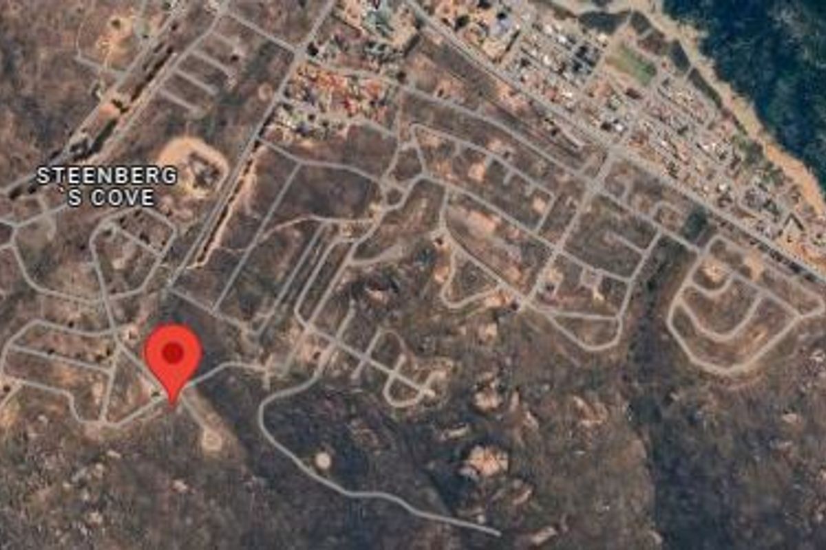An aerial satellite view showing the residential layout and road infrastructure of the Steenberg's Cove area.