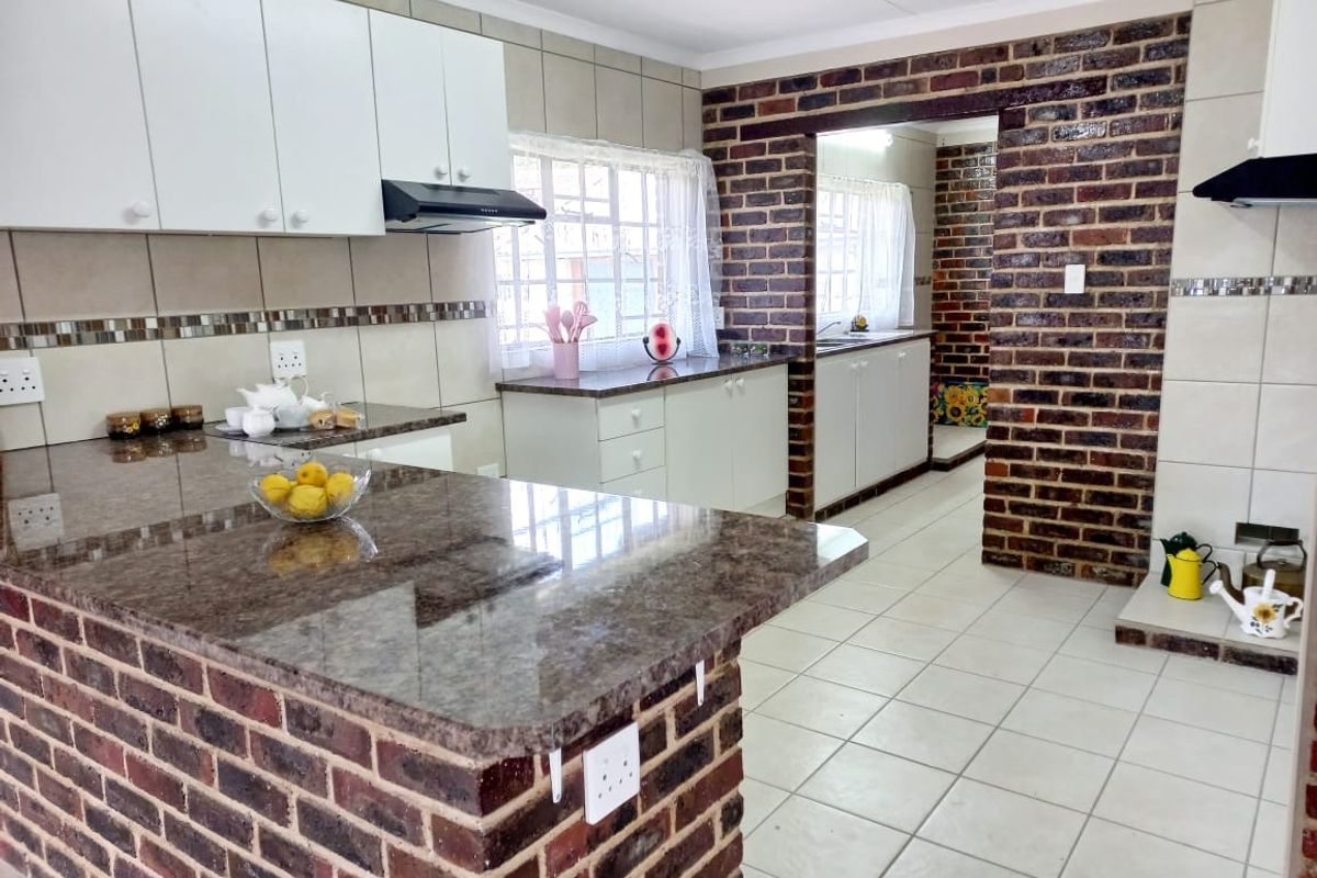 Discover your dream home in Rynfield, Benoni. This newly renovated 4- bedroom house, nestled close to schools and shops. - Photo 2