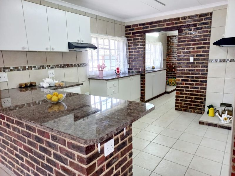 Discover your dream home in Rynfield, Benoni. This newly renovated 4- bedroom house, nestled close to schools and shops. - Photo 2
