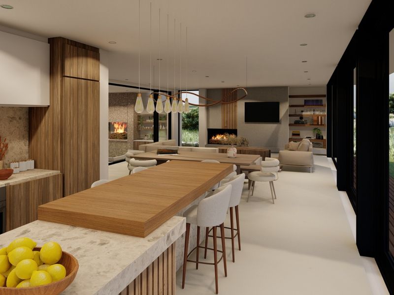 Modern open-plan living area featuring a sleek kitchen with stone island, integrated appliances, fireplace, and expansive sliding doors opening to the outdoors.