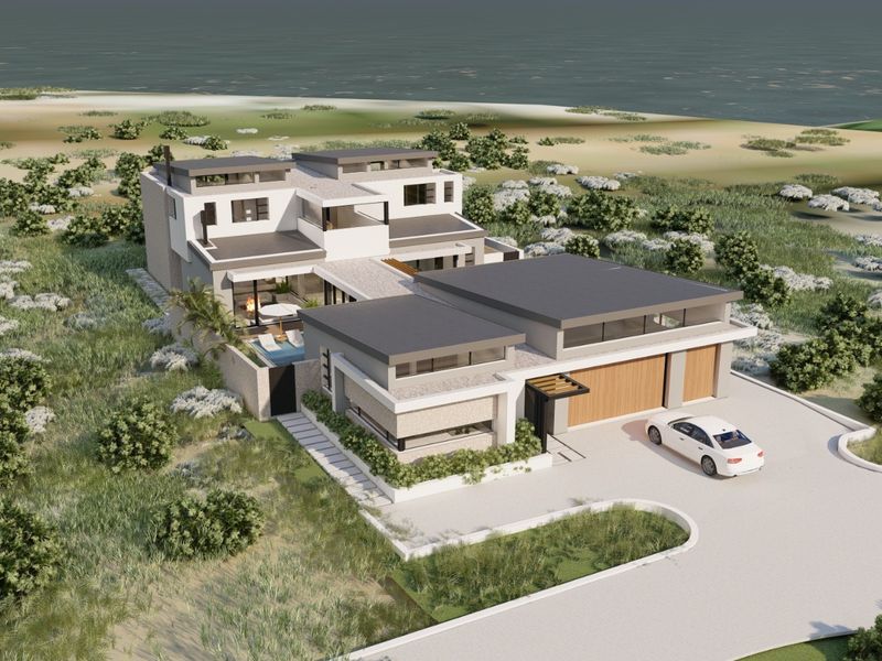 Aerial view of a modern coastal residence featuring a double garage, swimming pool, and contemporary architectural design set in a natural landscape.