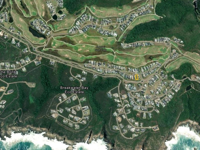 Aerial view of the residential estate and surrounding golf course landscape, highlighting the property location within the coastal development.