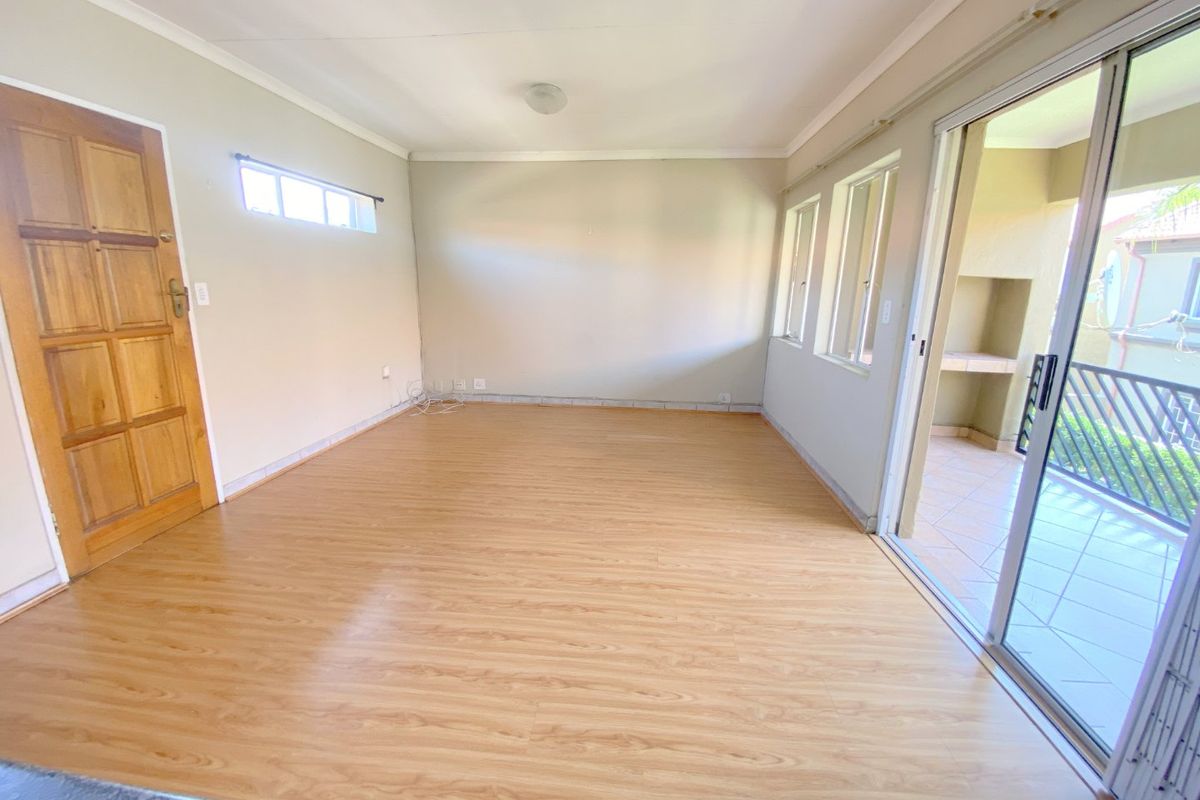 UNDER OFFER No transfer duties. Glen Garden Eden Glen, spacious and sunny 2 bedroom 1 bathroom unit with a garage at a giveaway price of R820 000. - Photo 4