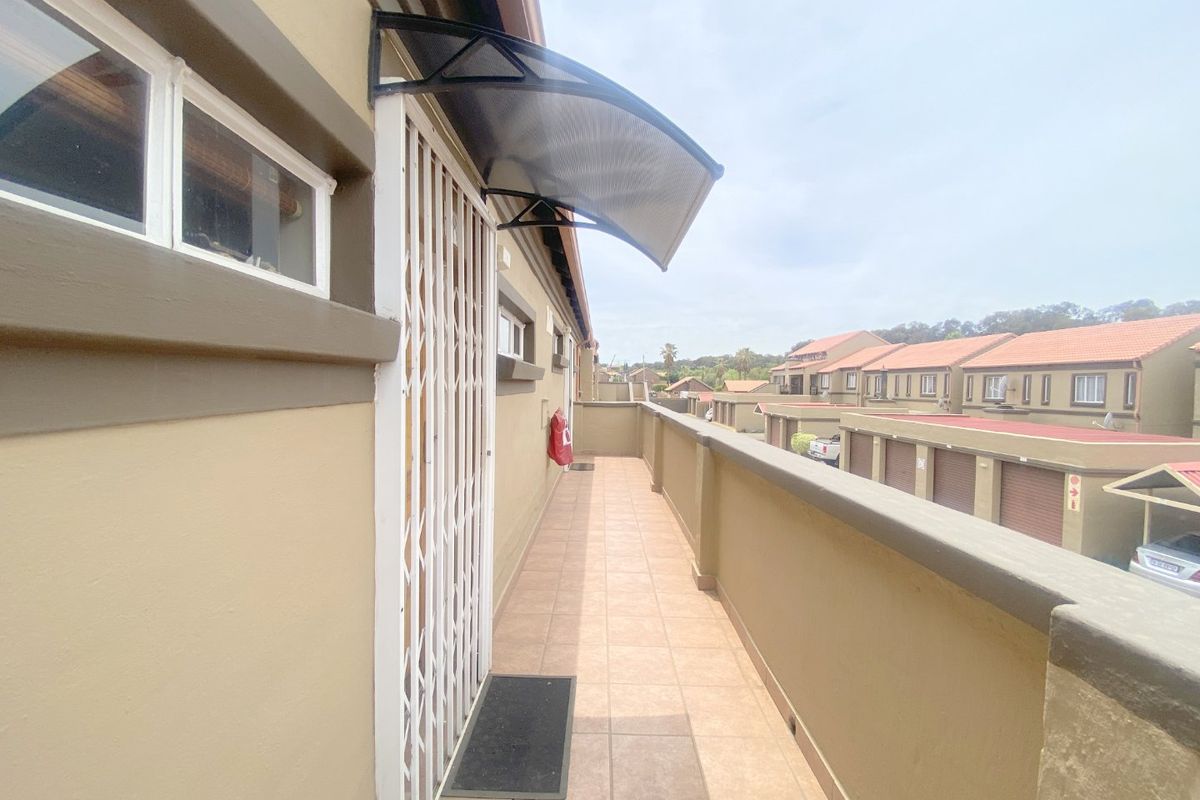 UNDER OFFER No transfer duties. Glen Garden Eden Glen, spacious and sunny 2 bedroom 1 bathroom unit with a garage at a giveaway price of R820 000. - Photo 3