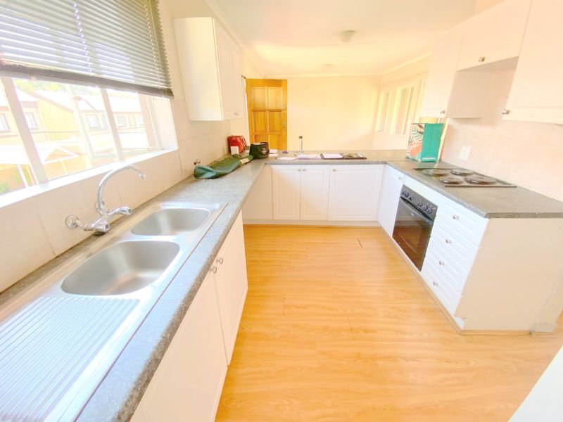 UNDER OFFER No transfer duties. Glen Garden Eden Glen, spacious and sunny 2 bedroom 1 bathroom unit with a garage at a giveaway price of R820 000. - Photo 6