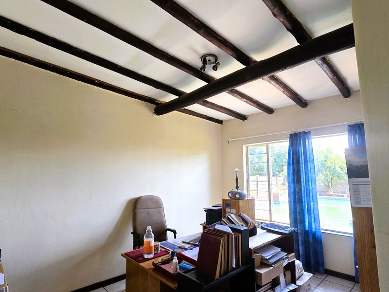 Spacious 4-Bedroom Family Home with a sparkling pool and a borehole For Sale in Rayton - Photo 10