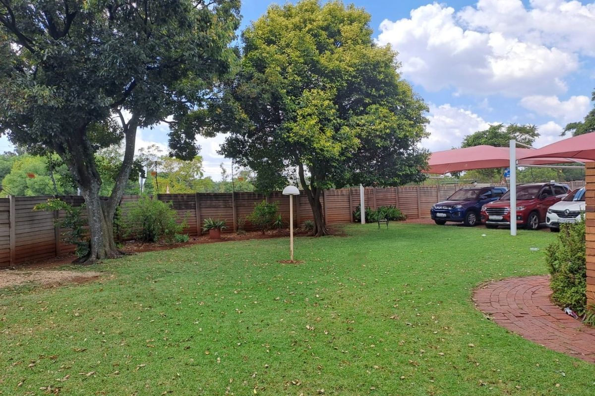 Spacious, Very Neat, Small Low Maintenance Garden! - Photo 3