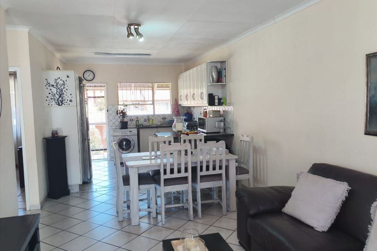 Neat Two-Bedroom Home with Double Pool and Carport - Photo 2